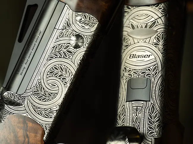 Blaser F3 III B. Leaf Scroll 12Ga 32" Super Sport Grade 11<br />

