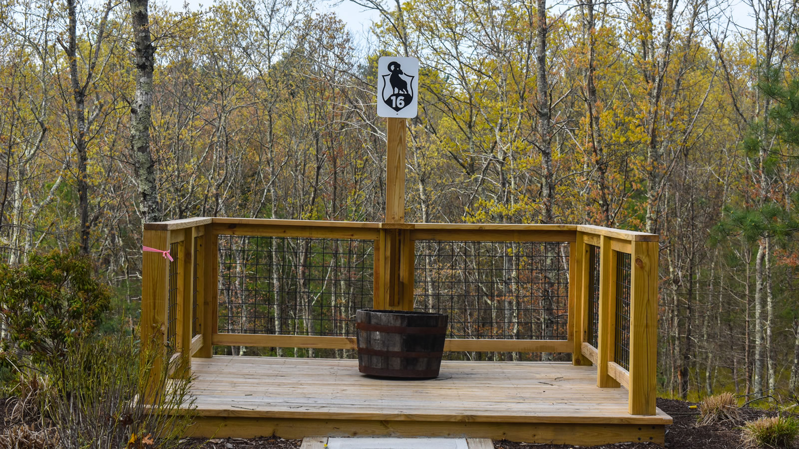 A shooter swings on a crossing target